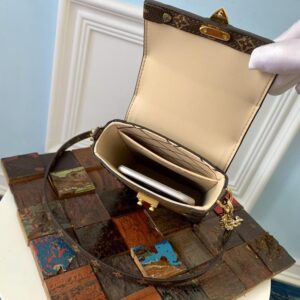 Louis Vuitton VERTICAL TRUNK POCHETTE - Image 9