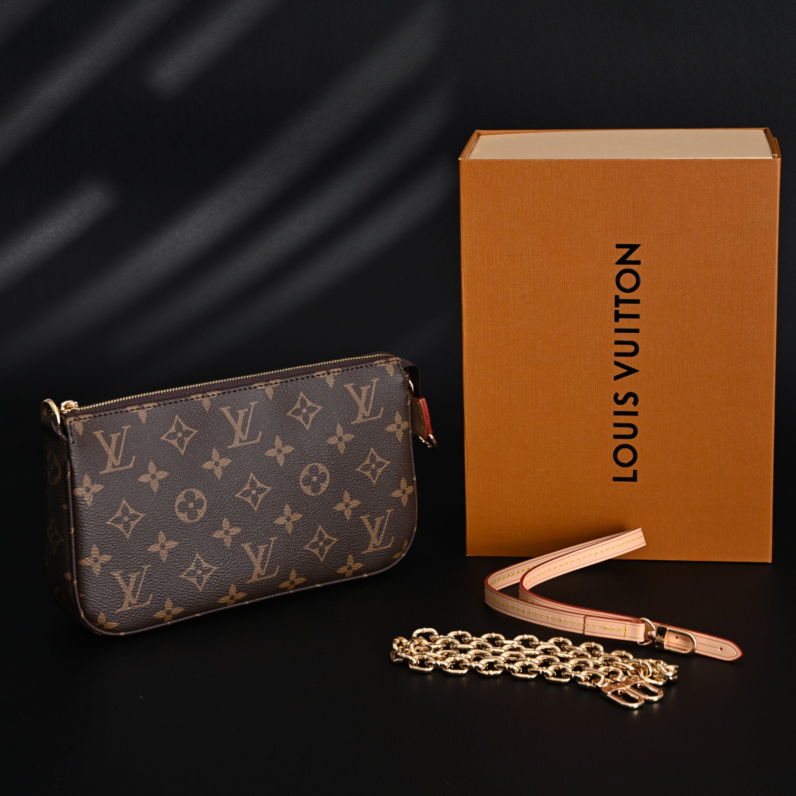 Louis Vuitton Pochette Accessoires Monogram Canvas Clutch Bag – Brown with Gold Chain (M82766) - Image 1