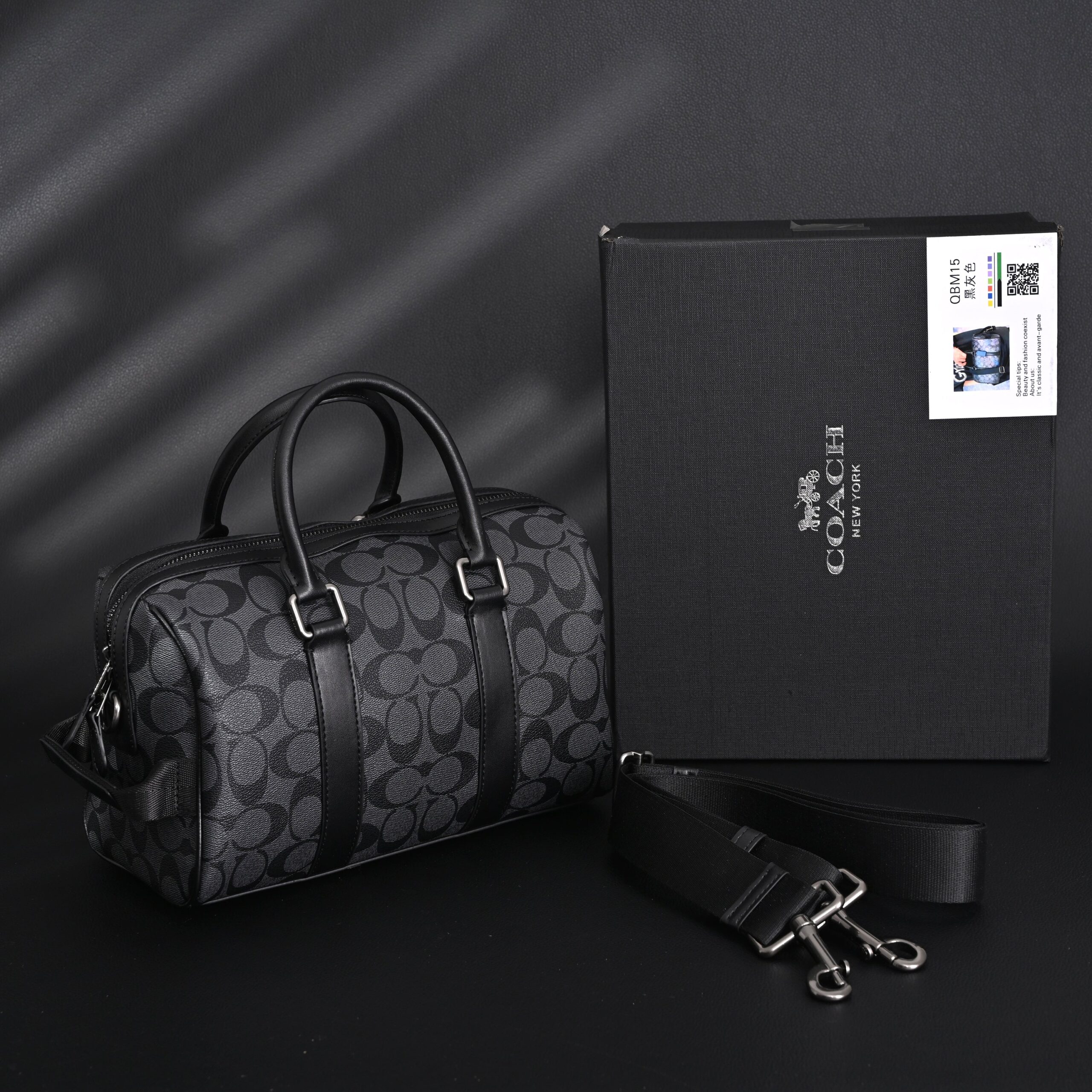 Coach Signature Duffel Bag – Black Monogram Canvas with Leather Trim - Image 1