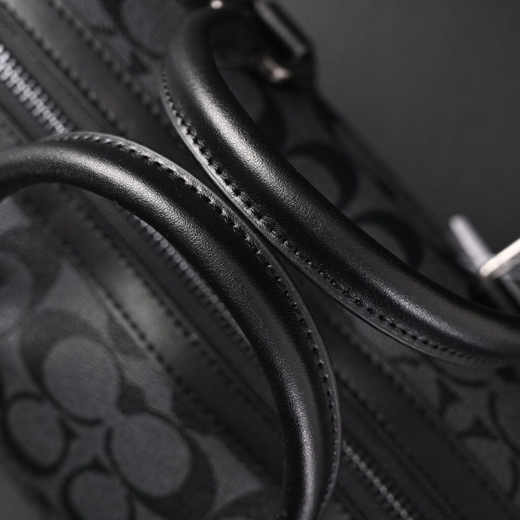 Coach Signature Duffel Bag – Black Monogram Canvas with Leather Trim