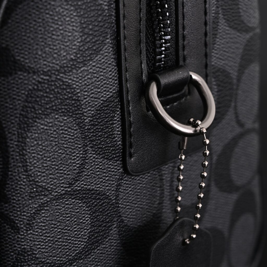 Coach Signature Duffel Bag – Black Monogram Canvas with Leather Trim