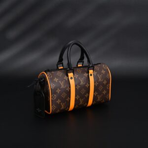 Louis Vuitton Keepall Bandoulière 50 – Monogram Canvas with Neon Orange Trim - Image 2