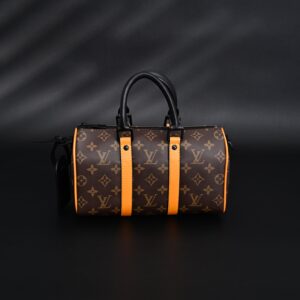 Louis Vuitton Keepall Bandoulière 50 – Monogram Canvas with Neon Orange Trim - Image 3