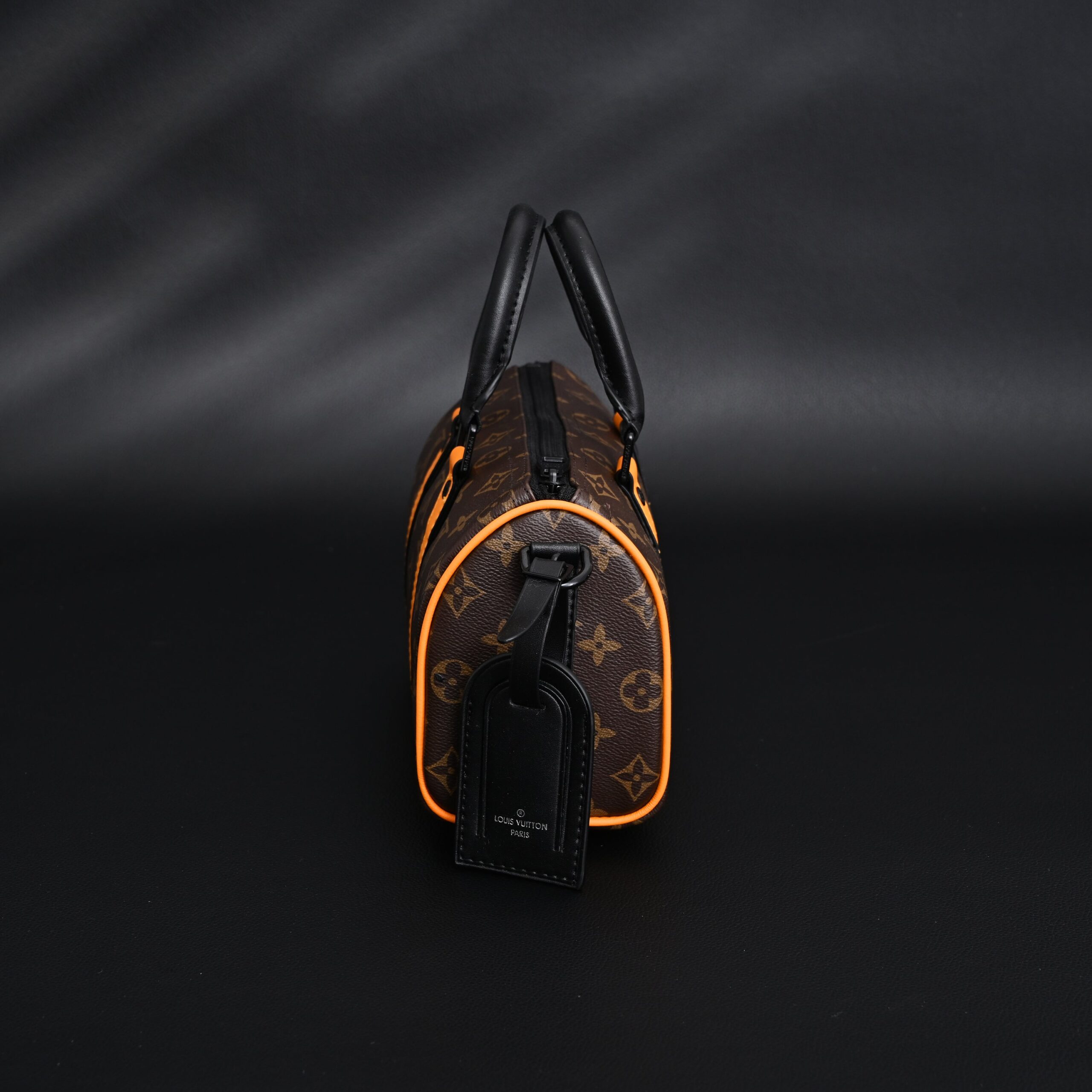 Louis Vuitton Keepall Bandoulière 50 – Monogram Canvas with Neon Orange Trim - Image 4