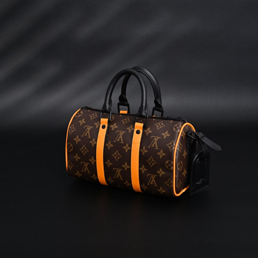 Louis Vuitton Keepall Bandoulière 50 – Monogram Canvas with Neon Orange Trim