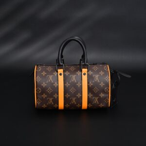 Louis Vuitton Keepall Bandoulière 50 – Monogram Canvas with Neon Orange Trim - Image 6