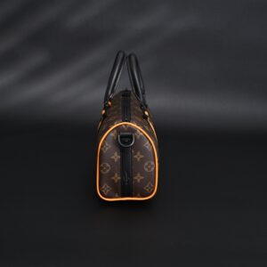 Louis Vuitton Keepall Bandoulière 50 – Monogram Canvas with Neon Orange Trim - Image 7