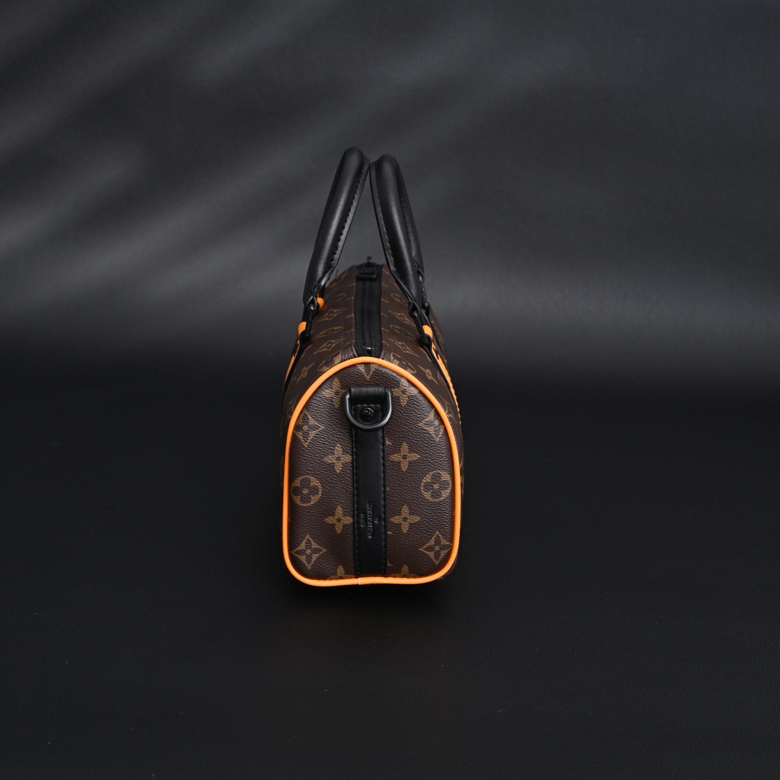 Louis Vuitton Keepall Bandoulière 50 – Monogram Canvas with Neon Orange Trim - Image 7