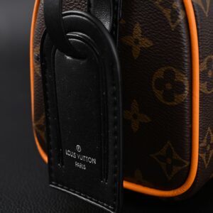 Louis Vuitton Keepall Bandoulière 50 – Monogram Canvas with Neon Orange Trim - Image 13