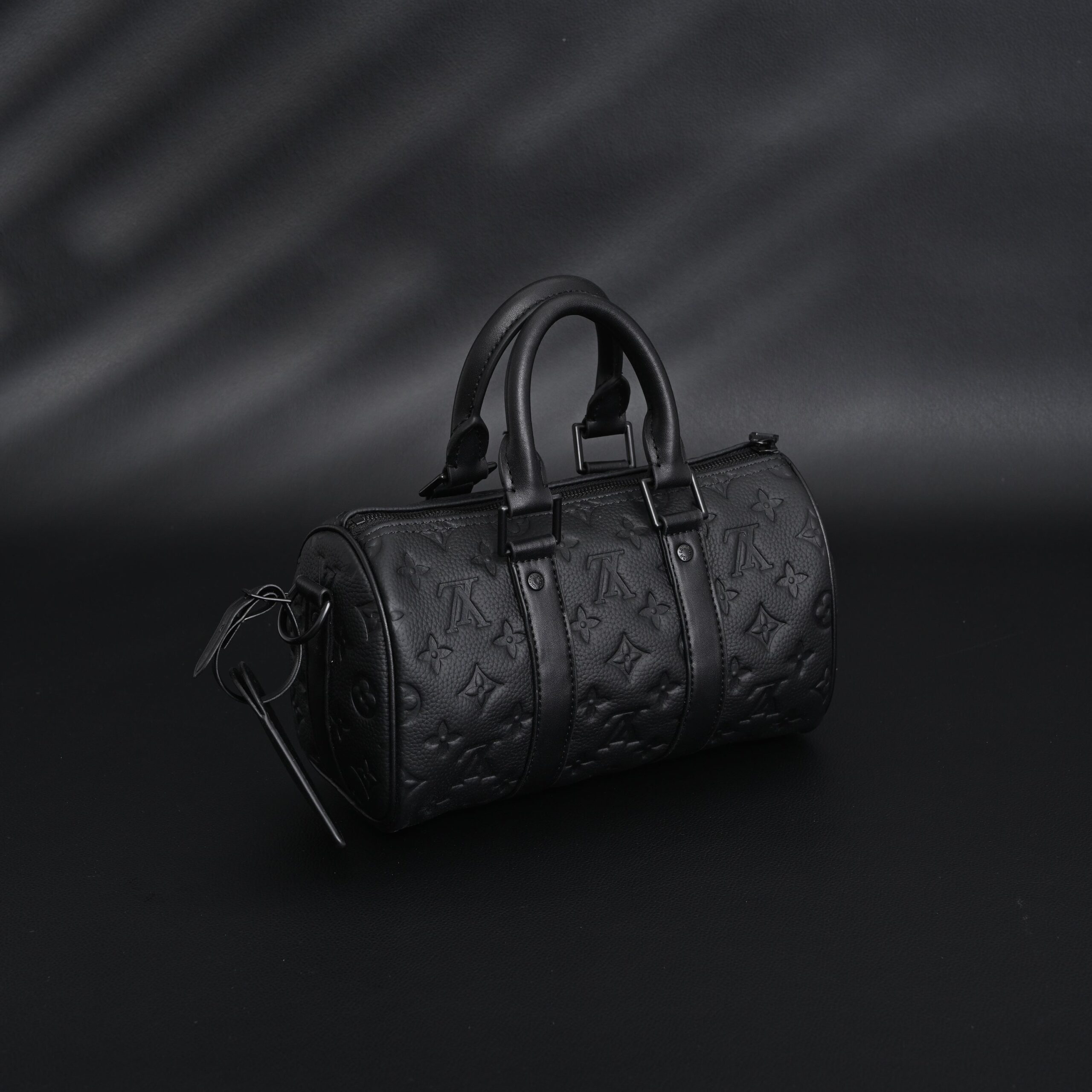 Louis Vuitton Keepall Bandoulière 50 – Monogram Shadow Black Leather - Image 2