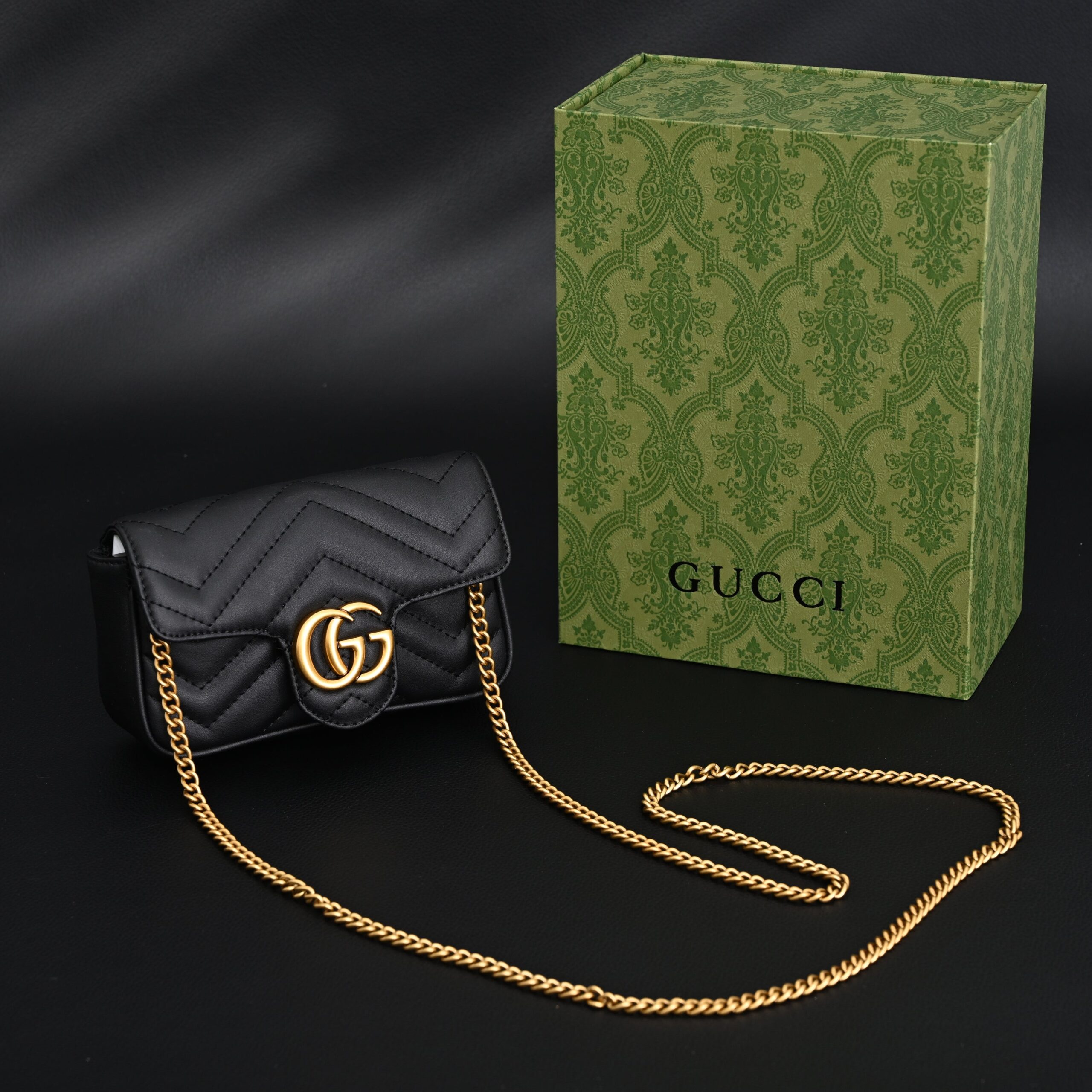 Gucci GG Marmont Matelassé Mini Shoulder Bag – Black Leather with Gold Chain - Image 1