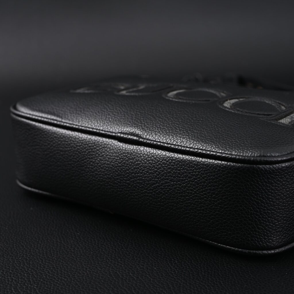 Gucci Black Leather Embossed Logo Belt Bag