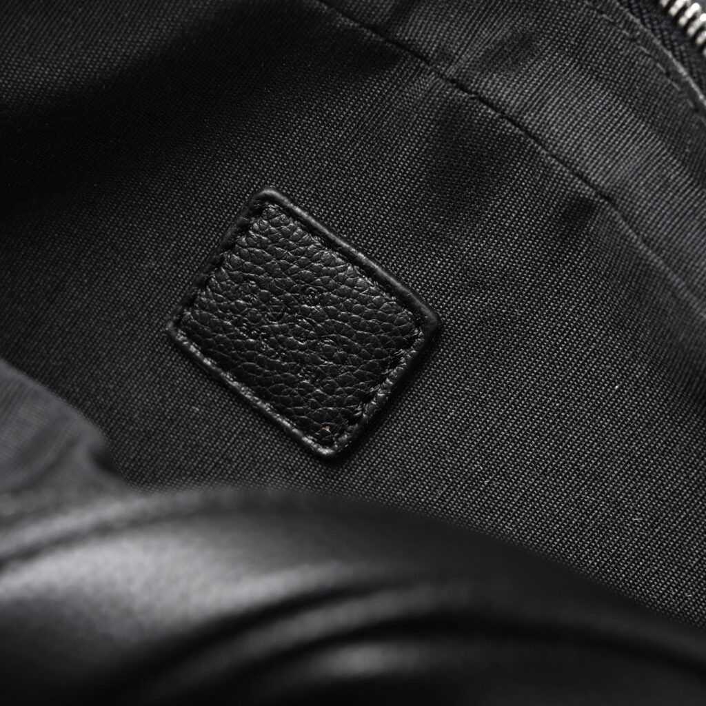 Gucci Black Leather Embossed Logo Belt Bag