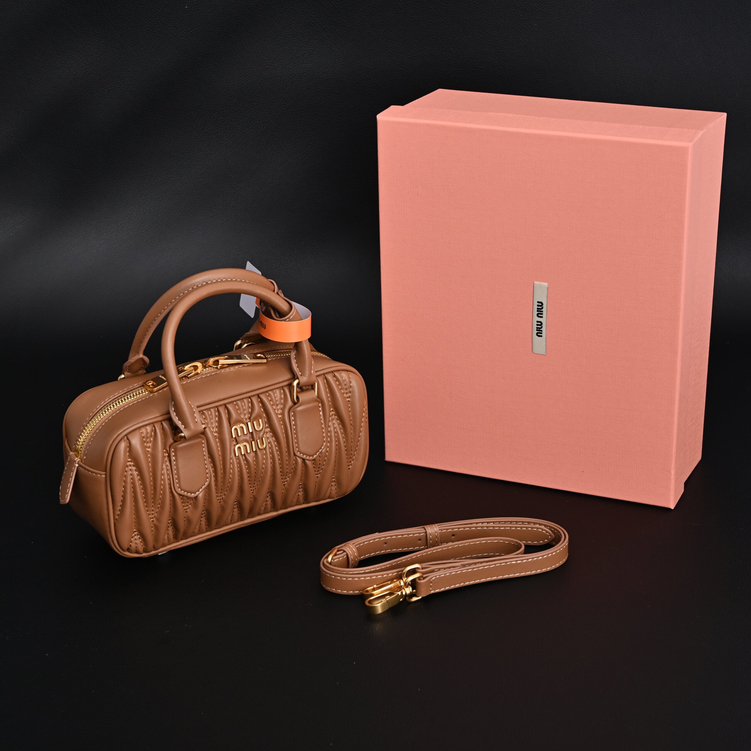 Miu Miu Matelassé Leather Top Handle Bag – Caramel Brown - Image 1