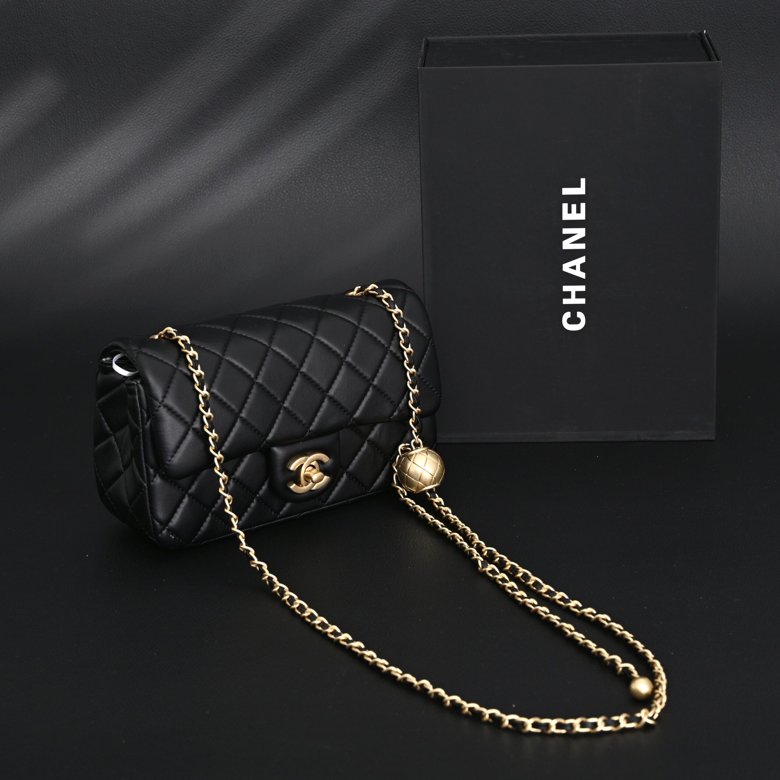 Chanel Classic Flap Mini Bag – Black Quilted Lambskin with Gold-Tone Hardware - Image 1