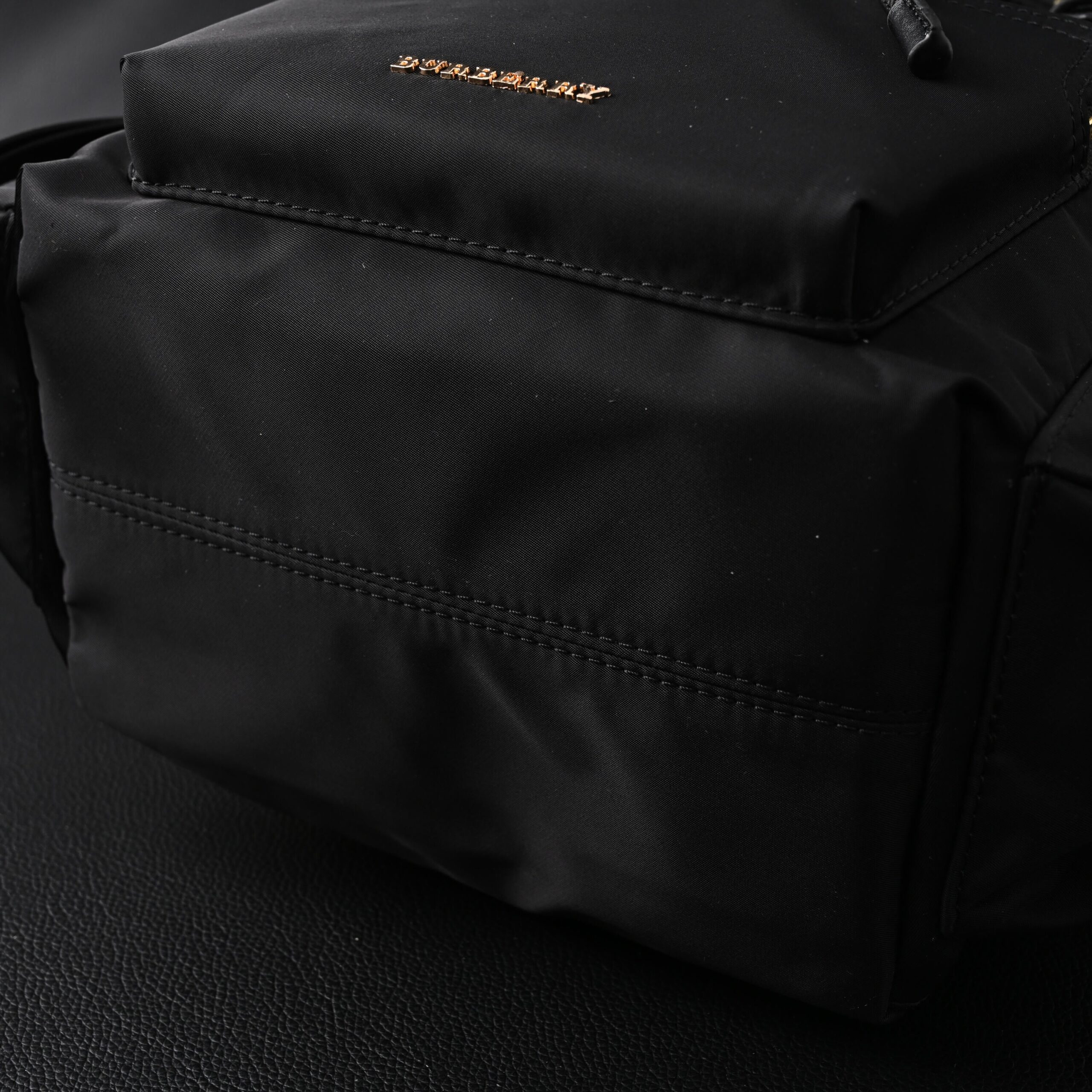 Burberry The Rucksack – Black Nylon & Leather Backpack with Gold-Tone Hardware - Image 11