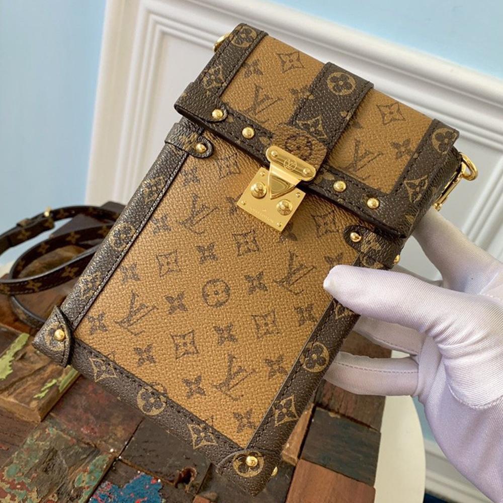 Louis Vuitton VERTICAL TRUNK POCHETTE - Image 1