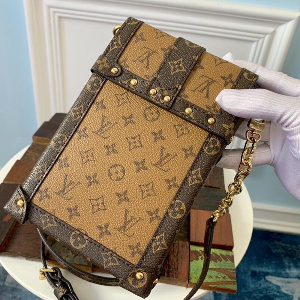 Louis Vuitton VERTICAL TRUNK POCHETTE - Image 8